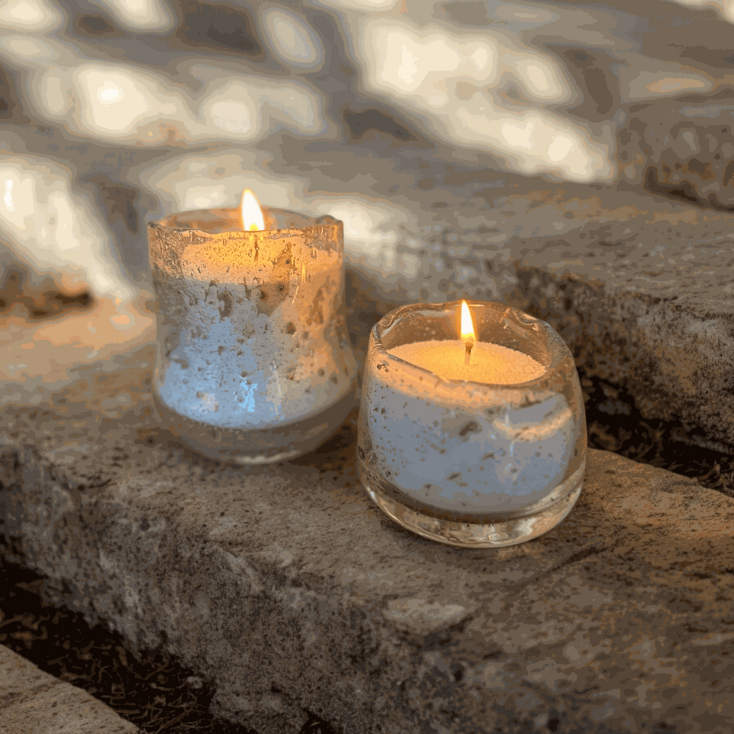 ecologisch kaarsenzand in 2 kleinere glazen potjes